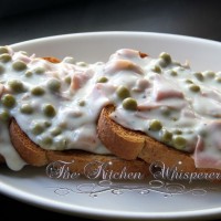 Shaved Ham in a bechamel sauce on toast with peas - pure comfort food!