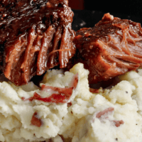 Truly the best boneless, fork-tender, fall-apart beef short ribs. These will melt in your mouth and become a family favorite.