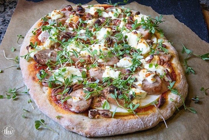 Apple Chicken Sausage Pizza with Goat Cheese, Pecans and Roasted Tomato Sauce