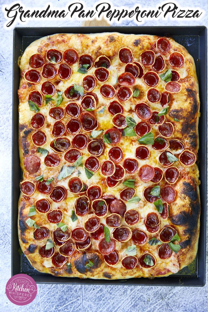 https://www.thekitchenwhisperer.net/wp-content/uploads/2020/06/Classic-Grandma-Pizza-with-Pepperoni-Cups-Pinterest-11-800x1200.jpg