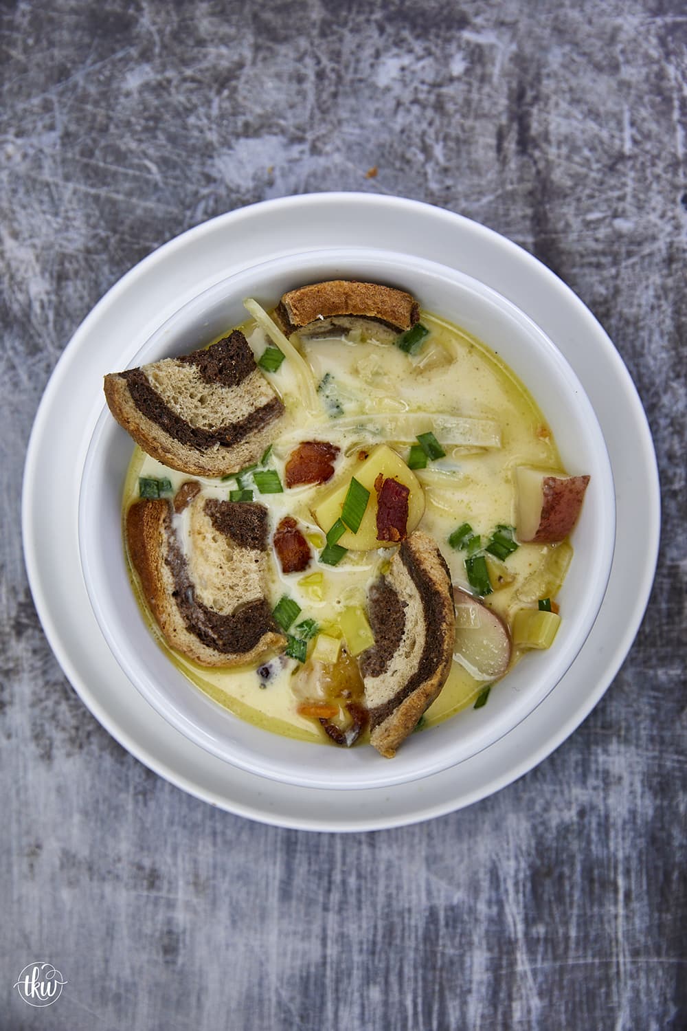 White Cheddar Potato Leek Soup with Bacon and Chives