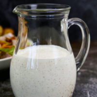 This creamy buttermilk feta dressing is loaded with herbs, feta cheese, and acid to make this the perfect salad dressing or dip! The Best Homemade Creamy Feta Dressing, feta dressing, feta dip, whipped feta, herb feta dressing, buttermilk feta salad dressing, from scratch dressing, Greek feta dressing