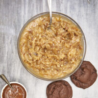 The most amazing creamy caramel coconut, pecan decadent frosting you'll ever taste! The Ultimate German Chocolate Frosting, easy German chocolate frosting, old fashioned german chocolate frosting, caramel pecan coconut frosting, german chocolate frosting with sweetened condensed milk, holiday baking