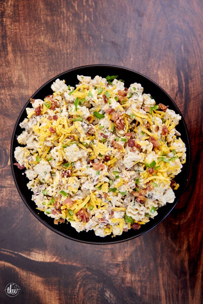 Transform chicken, crispy bacon, cheddar cheese, and cooked pasta coated in a homemade ranch dressing into the most amazing pasta salad! Ultimate Bacon Chicken Ranch Pasta Salad easy pasta salad, rotisserie chicken salad, bbq chicken pasta salad, cookout foods, leftover salads, hot and cold salads