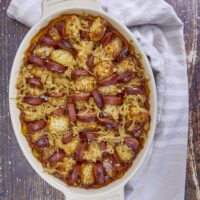 Pairing Sweet BBQ Baked Beans with Sweet & Smoky BBQ Sauerkraut, topping it with potato tots and kielbasa for The perfect game-day or weeknight casserole! The Ultimate Fall & Football Casserole, The Ultimate Fall & Football Casserole with Baked Beans, Sweet & Smoky Sauerkraut, Crispy Tots and Kielbasa, comfort food, weeknight casserole, football foods, kielbasa and sauerkraut, bbq baked beans, tailgating food, homegating recipes, tailgating recipes, one pan meals