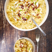 The perfect one-pot pasta & cheese dish! Cavatappi noodles coated in a delicious spicy southwestern cheese sauce with bits of corn, bacon, and hatch chiles! Easy, cheesy, and there's no draining required! Ultimate One-Pot Spicy Southwestern Cheesy Pasta, mac 'n cheese, one pot mac & cheese, cavatappi and cheese, bacon mac & cheese, southwestern mac and cheese, one pan recipe