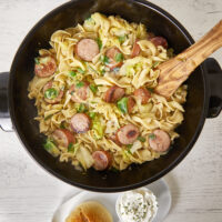 Are you in the mood for a hearty and comforting meal that won't break the bank? Look no further than Mom's Rustic Slovak recipe! This delicious dish features butter-fried onions and cabbage, tender egg noodles, flavorful seasonings, and optional charred kielbasa. The Best Pittsburgh Haluski - Fried Cabbage and Noodles in Butter, Lenten recipes, fried cabbage, Slovak haluski, easy recipes, budget-friendly, Pittsburgh recipes, Slovak recipes, halushki