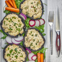 These cheesy stuffed mushroom caps are a flavor explosion in every bite. A true culinary delight that’s perfect for any occasion! Boursin Stuffed Mushroom Caps On The Smoker, stuffed mushrooms, stuffed portobello mushrooms, cheese stuffed mushrooms, smoked mushrooms, yoder smokers ys640, cheesy mushrooms