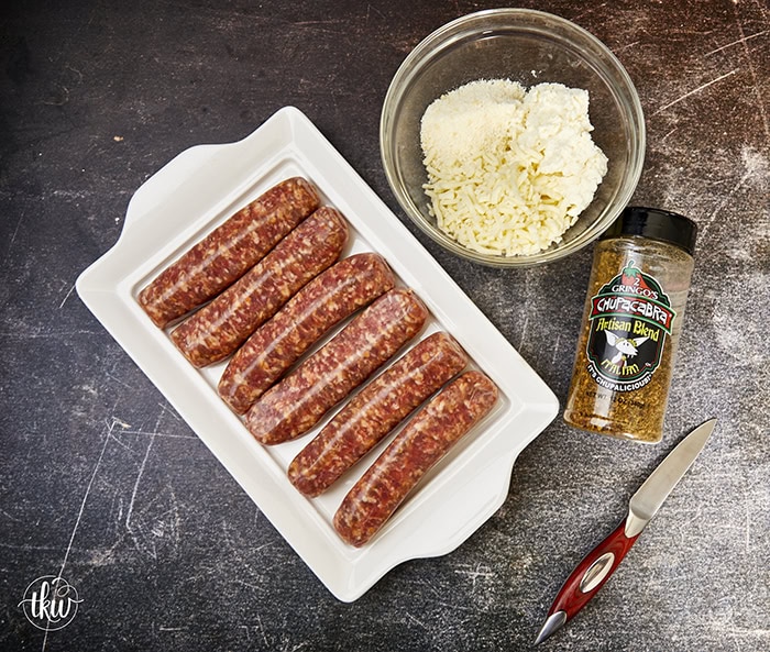 Tantalize your taste buds with a mouthwatering dish that combines the savory goodness of Italian sausage stuffed with the creamy indulgence of ricotta cheese. Fire up the smoker, gather your ingredients, and prepare to elevate your grilling game with this delicious recipe. Ricotta Stuffed Italian Sausage Boats on the Smoker, cheesy italian sausage, stuffed sausage, smoked sausages, yoder smoker sausage, smoked sausage boats