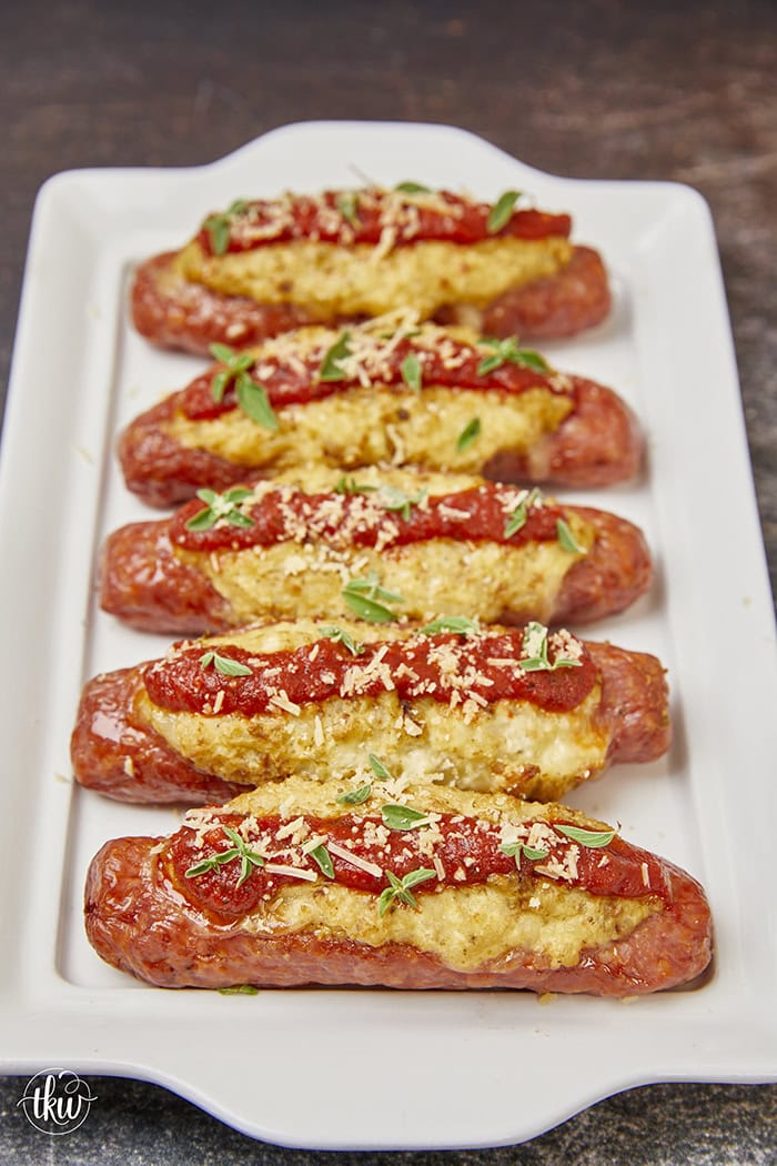 Tantalize your taste buds with a mouthwatering dish that combines the savory goodness of Italian sausage stuffed with the creamy indulgence of ricotta cheese. Fire up the smoker, gather your ingredients, and prepare to elevate your grilling game with this delicious recipe. Ricotta Stuffed Italian Sausage Boats on the Smoker, cheesy italian sausage, stuffed sausage, smoked sausages, yoder smoker sausage, smoked sausage boats