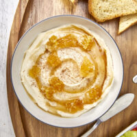 Just 3 ingredients are needed to make this easy & incredibly delicious recipe. From bagels to desserts, fruit to crostini, this is truly irresistible! Deliciously Easy 3-Ingredient Vanilla Honey Whipped Ricotta, sweetened ricotta, ricotta spread, dessert ricotta, uses for leftover ricotta, bagel spread, crostini spread, cheesy dip, fruit dip