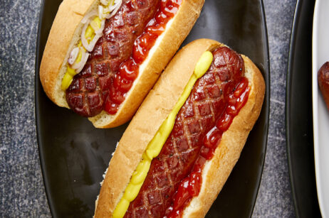 Are you looking to take your cookout game to the next level? Cross-hatching hotdogs, seasoning them with brisket seasoning, and smoking them make them one of the best hot dogs you'll ever have! The Best Smoked Hot Dogs You'll Ever Eat, cross-hatch cut hot dogs, yoder smoked hot dogs, grilled hot dogs, cook out foods, football food, game day eats