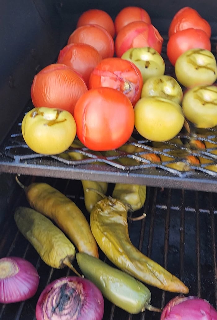 Smoking your vegetables is the secret ingredient you've been missing to elevate your salsa to something truly outstanding. Adding a smoky twist can transform your hatch chile salsa into a flavor fiesta like no other! The Best Smoked Hatch Chile Salsa, red hatch salsa, hatch chile season, smoked vegetables, chips and salsa, restaurant salsa, salsa fiesta, yoder smokers smoked salsa