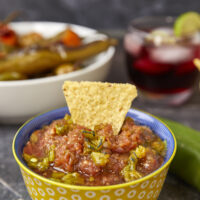 Smoking your vegetables is the secret ingredient you've been missing to elevate your salsa to something truly outstanding. Adding a smoky twist can transform your hatch chile salsa into a flavor fiesta like no other! The Best Smoked Hatch Chile Salsa, red hatch salsa, hatch chile season, smoked vegetables, chips and salsa, restaurant salsa, salsa fiesta, yoder smokers smoked salsa