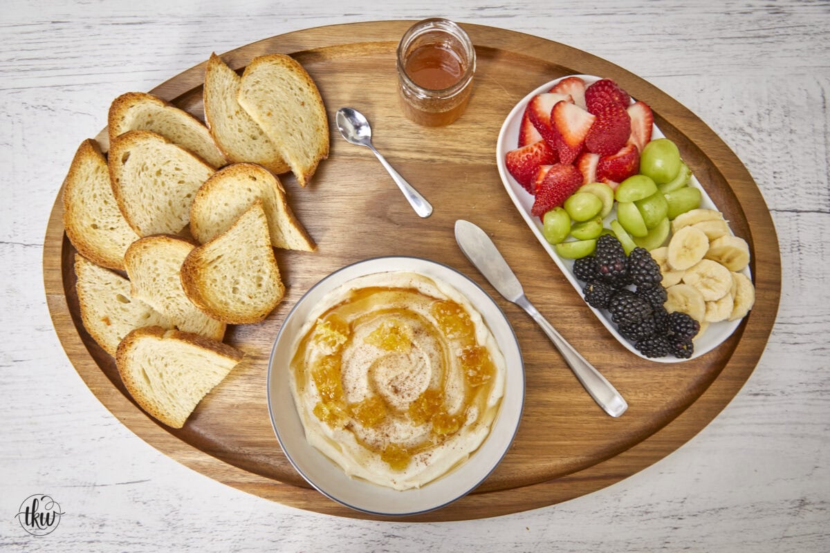 Honeycomb, whipped vanilla honey ricotta, and fresh fruits come together in a heavenly dessert crostini. This simple and sweet delight that will elevate any gathering or simply satisfy your sweet cravings. Simple Sweet Honeycomb Ricotta & Fresh Fruits Dessert Crostini, sweetened ricotta, ricotta spread, dessert ricotta, uses for leftover ricotta, bagel spread, crostini spread, cheesy dip, fruit dip, 3-ingredient ricotta dip