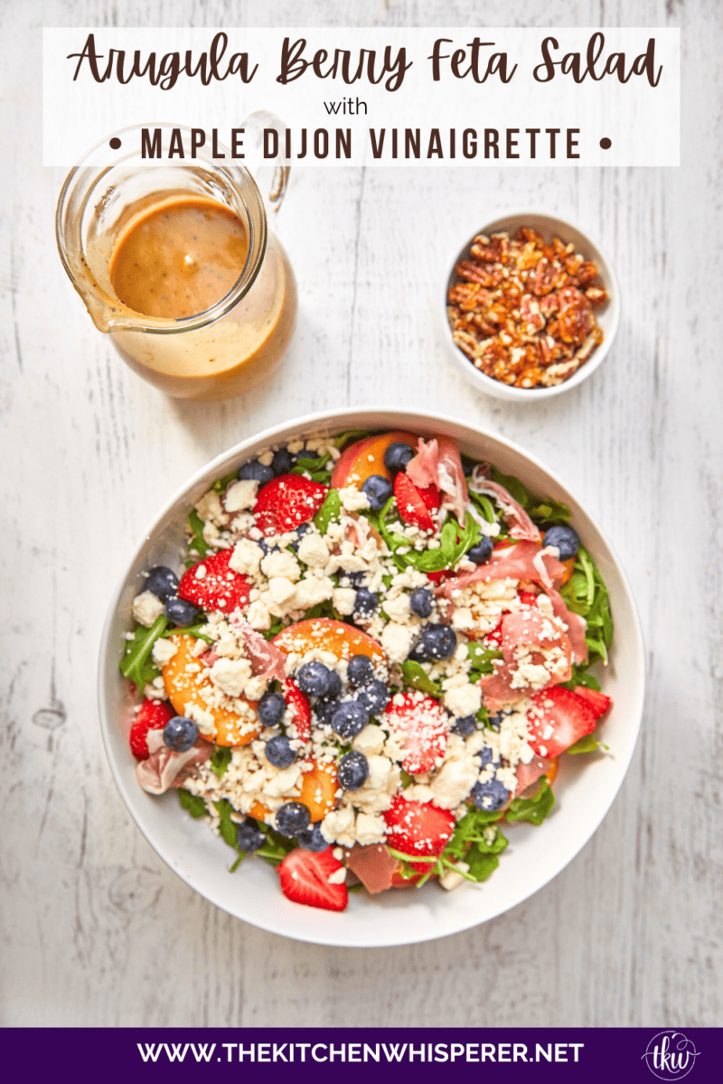 This arugula salad is bursting with freshness from feta, berries, and peaches, drizzled with a maple Dijon vinaigrette, and topped off with crunchy candied nuts. This salad is a delightful blend of savory and sweet that will tantalize your taste buds.