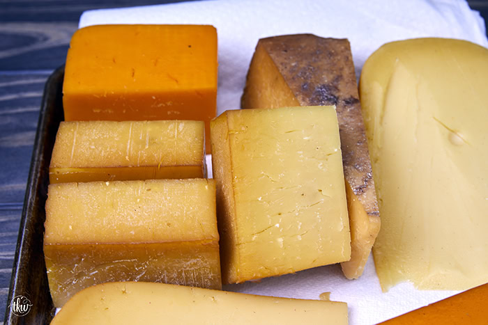 Smoked cheese is an amazing flavor boost to your charcuterie board, a sandwich, or any pasta dish. Learn how to cold smoke cheese at home!