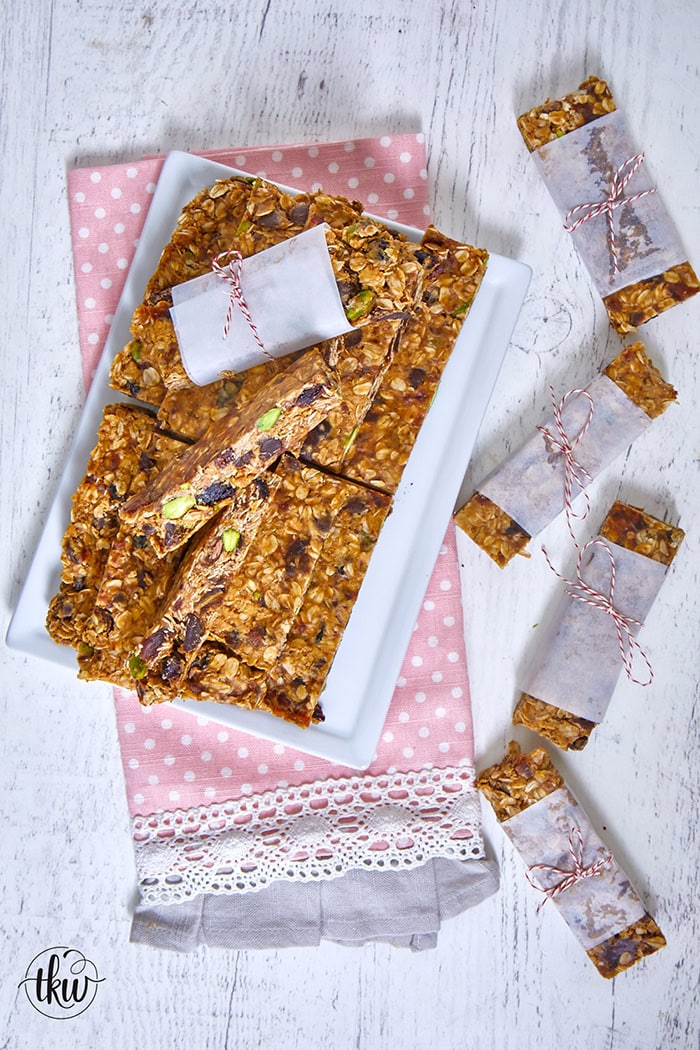 Deliciously naturally sweet, these no-bake peanut butter oat date bars are the perfect sweet treat full of pistachios, dried cranberries, and dark chocolate chips