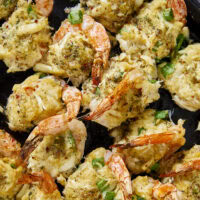 Transform your next meal with these smoky, tender shrimp stuffed with a rich jumbo lump crab filling; all topped off with a decadent garlic shallot butter sauce that’ll leave everyone craving more!