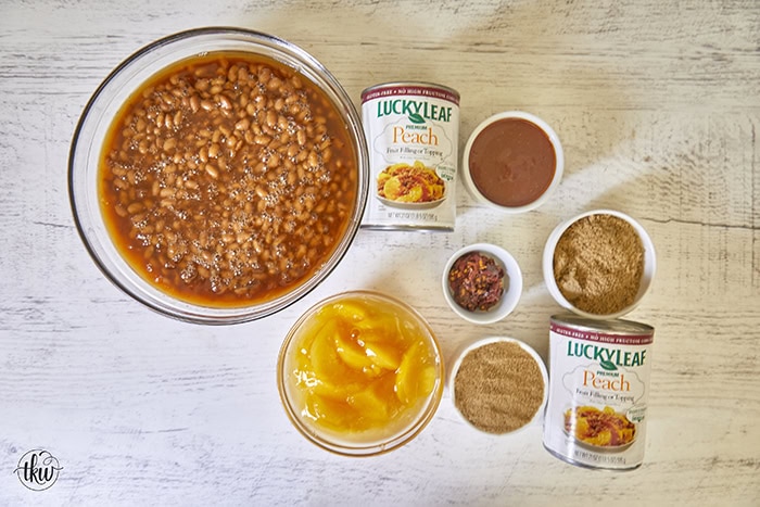 These Smoked Peach Pie Chipotle Baked Beans bring a bold, irresistible twist to a classic side dish. Slow-smoked beans soak up a rich, smoky sauce that combines the natural sweetness of peach filling with the smoky heat of chipotle peppers.