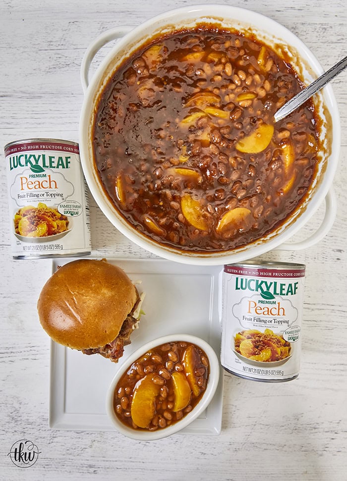 These Smoked Peach Pie Chipotle Baked Beans bring a bold, irresistible twist to a classic side dish. Slow-smoked beans soak up a rich, smoky sauce that combines the natural sweetness of peach filling with the smoky heat of chipotle peppers.