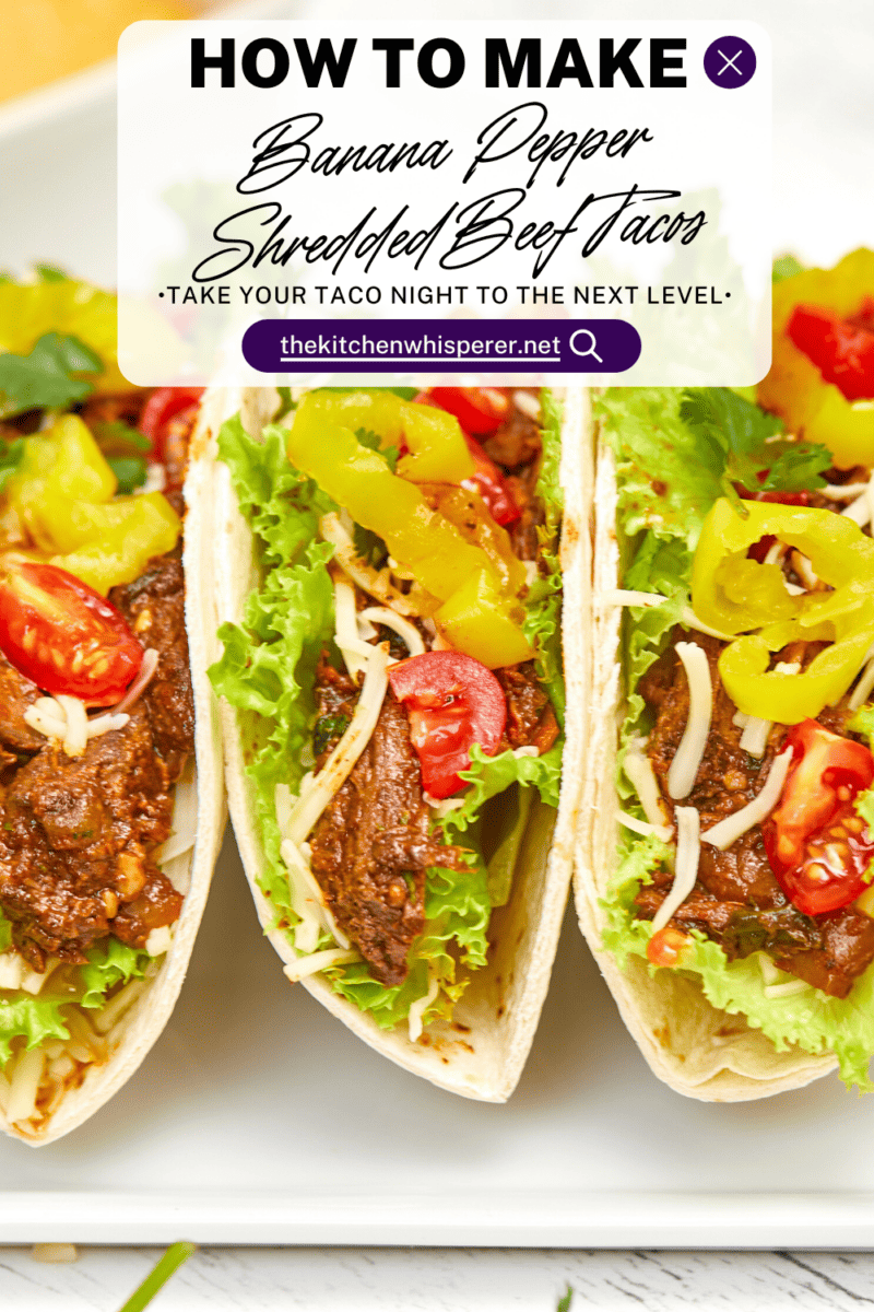 Warm flour tortillas filled with melt-in-your-mouth beef infused with bold spices, tangy banana peppers, fresh veggies, lime crema, and a sprinkling of cheese make these tacos a standout at any dinner table.