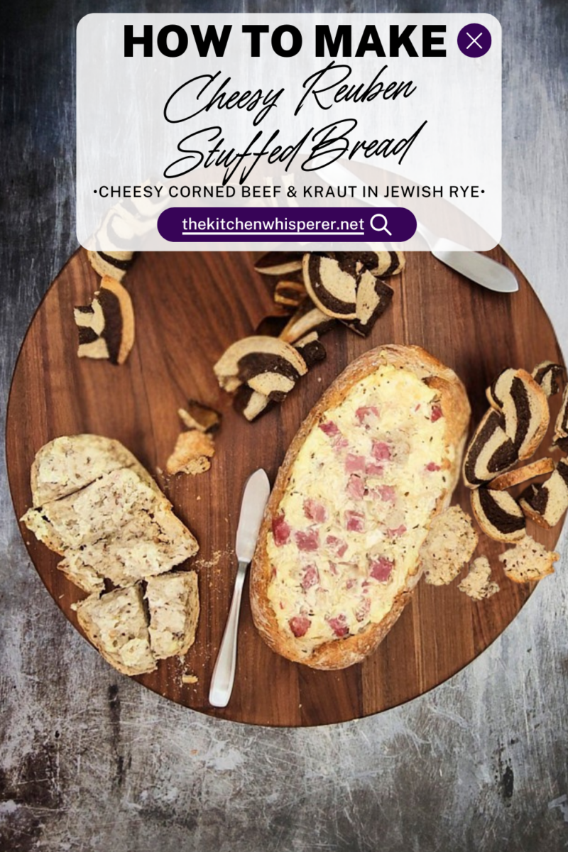 This cheesy flavor-packed recipe takes everything you love about a Guinness corned beef Reuben sandwich and bakes it into a hollowed-out Jewish rye bread loaf for the ultimate party dip.