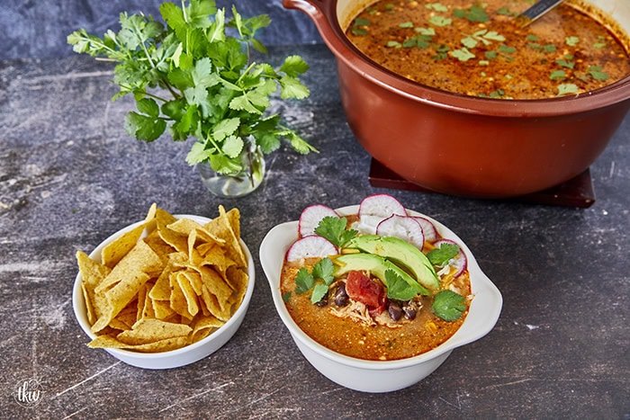 This Creamy Cheesy Chicken Enchilada Soup is the perfect blend of comfort and spice, made with simple pantry staples. Juicy shredded chicken, fire-roasted tomatoes, black beans, and peppers come together in a velvety broth infused with smoky Mexican spices. This soup delivers all the flavors of classic enchiladas in one easy, one-pot recipe.