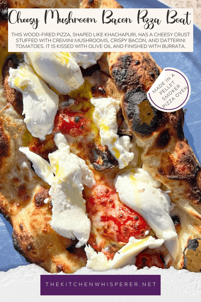 This wood-fired pizza, shaped like khachapuri, has a cheesy crust stuffed with cremini mushrooms, crispy bacon, and datterini tomatoes. It's then kissed with olive oil and finished with burrata, making it your new favorite pizza!